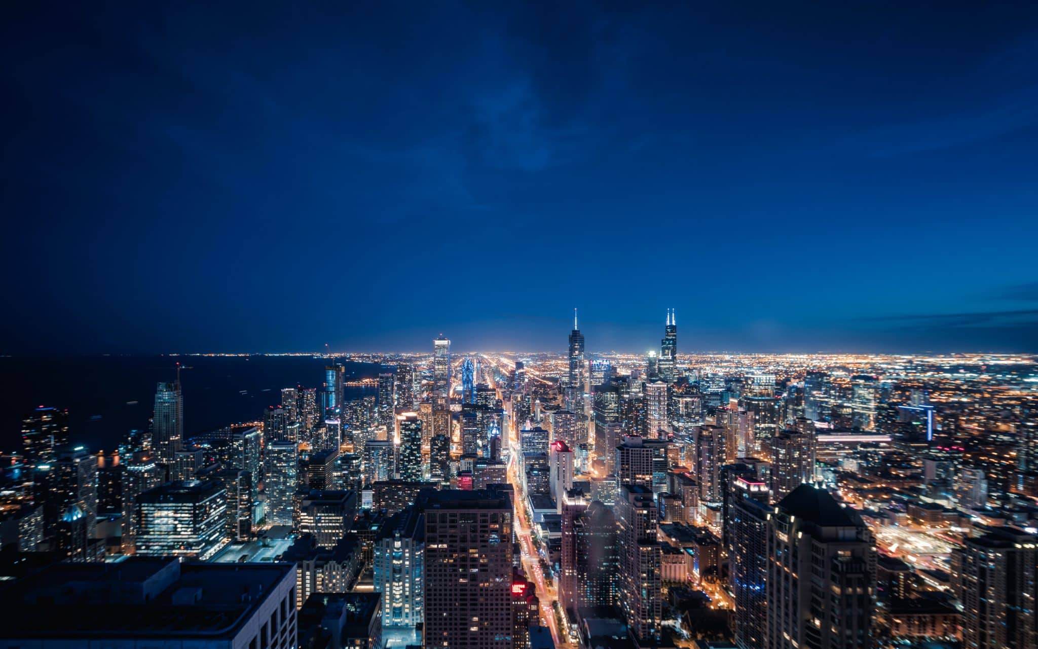 Aerial View Of Chicago Cityscape Skyline At Night 1160442138 7889x4931 Scaled 